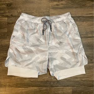 Sport shorts with liner in size L.